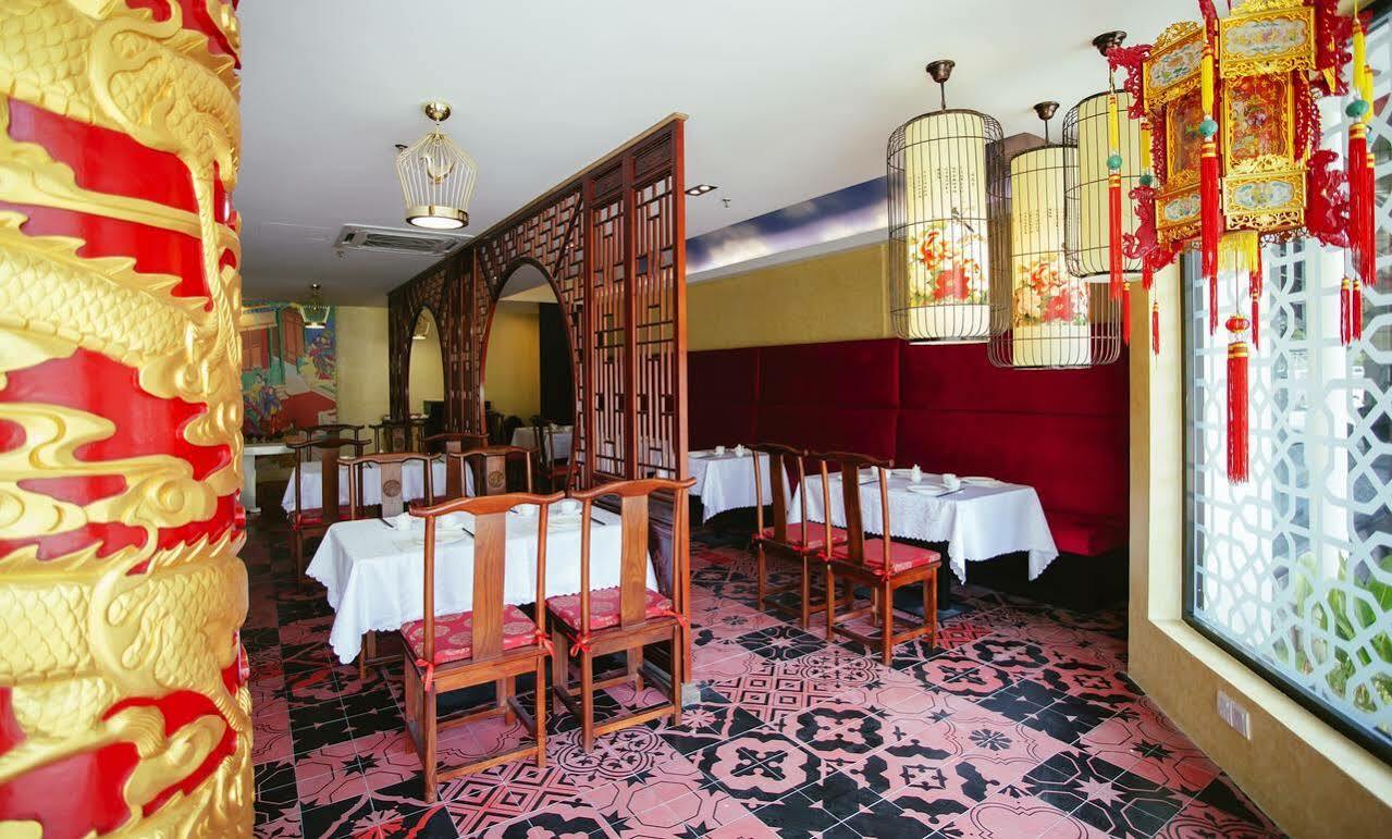 Sand & Sandals Desaru Beach Resort & Spa Екстер'єр фото Interior of a restaurant in Beijing